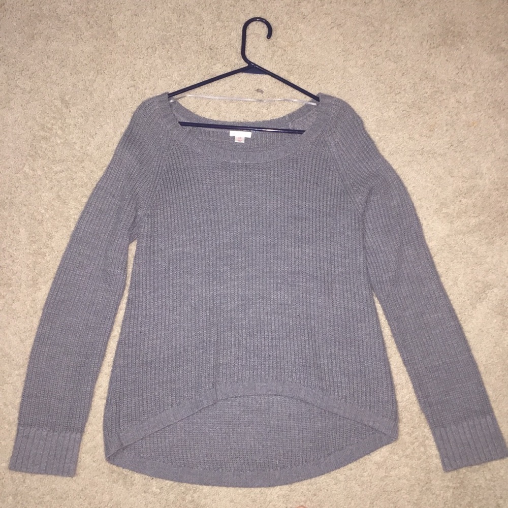 I am selling a grey sweater.